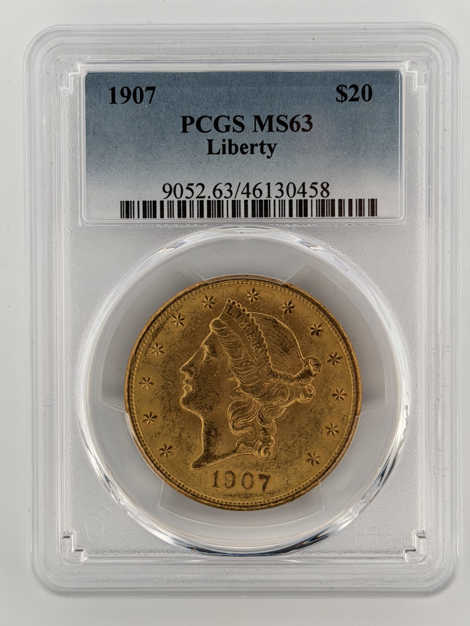 1907-P $20 Gold Liberty Double Eagle PCGS MS63 obverse in slab showing Liberty portrait and 13 stars