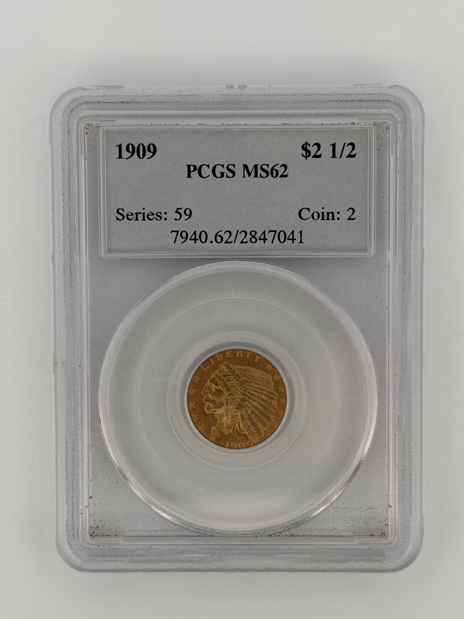 1909-P $2.50 Gold Quarter Eagle PCGS MS62 obverse showing incuse Indian Head design in PCGS slab