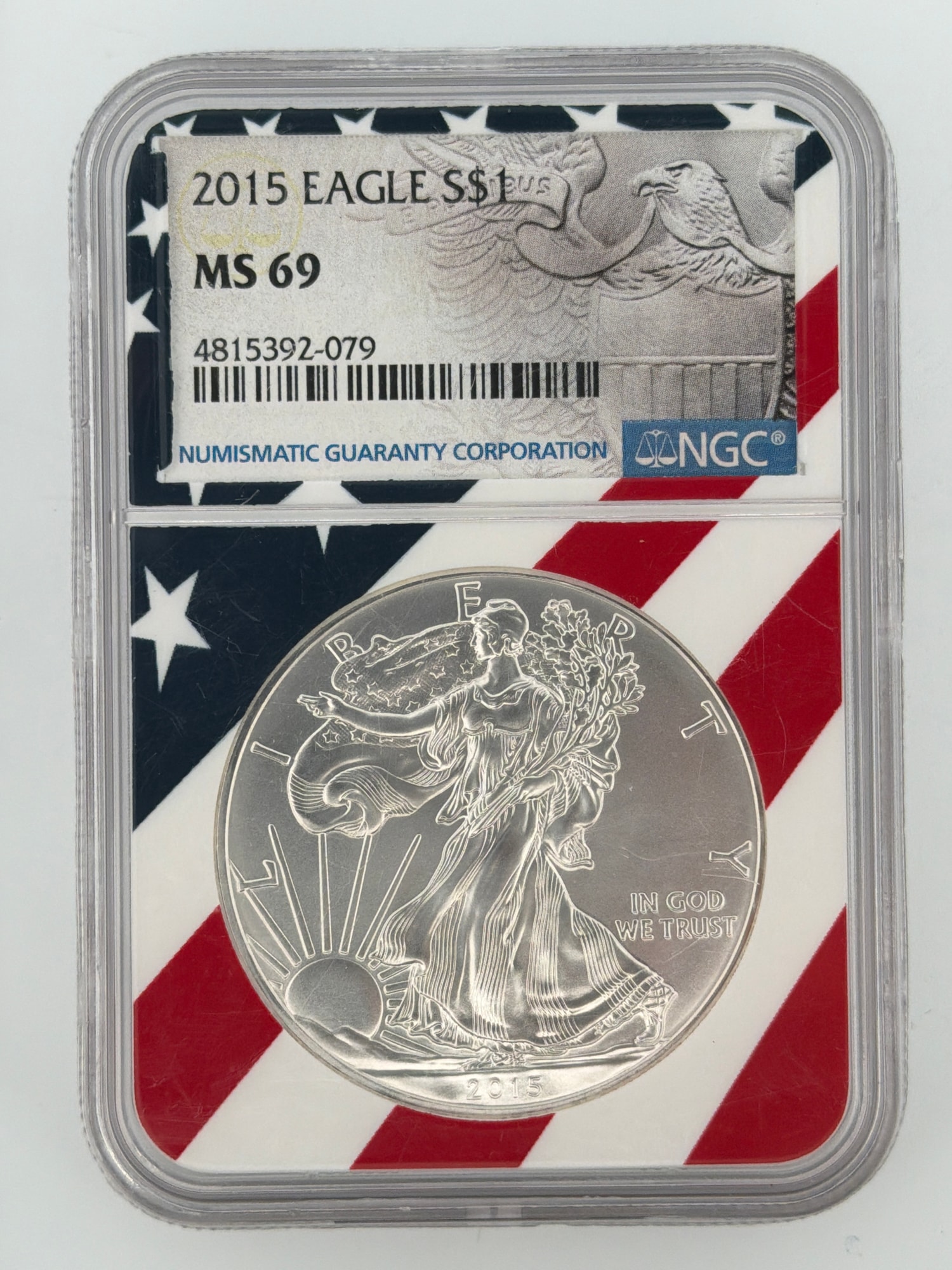 2015 American Silver Eagle NGC MS69 obverse showing Walking Liberty design in patriotic NGC flag slab