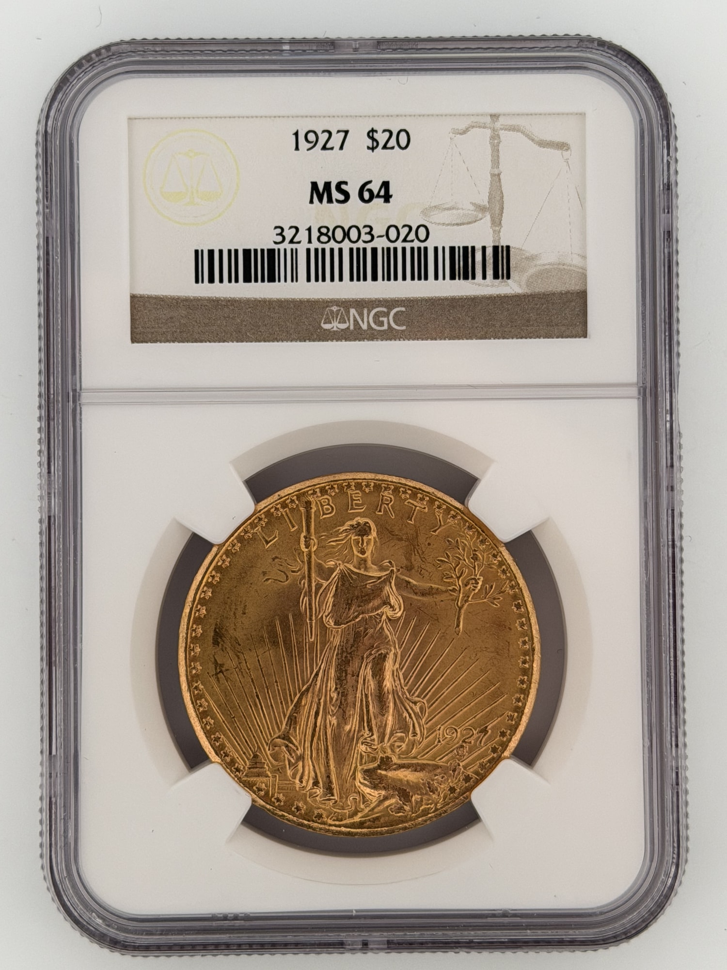 1927 Saint-Gaudens Double Eagle $20 Gold NGC MS64 obverse showing striding Liberty with torch and olive branch in NGC slab