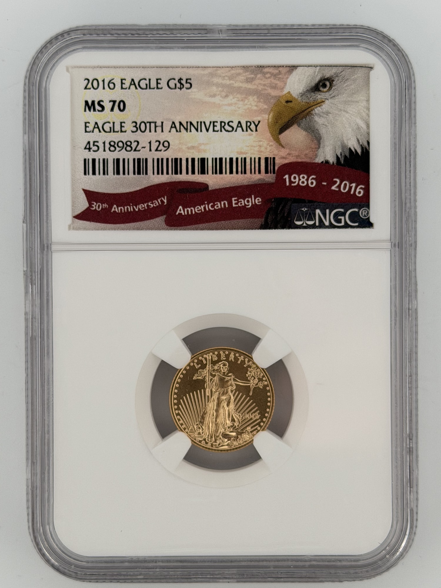 2016 American Gold Eagle 1/10 oz $5 NGC MS70 obverse in 30th Anniversary commemorative slab, showing Walking Liberty design