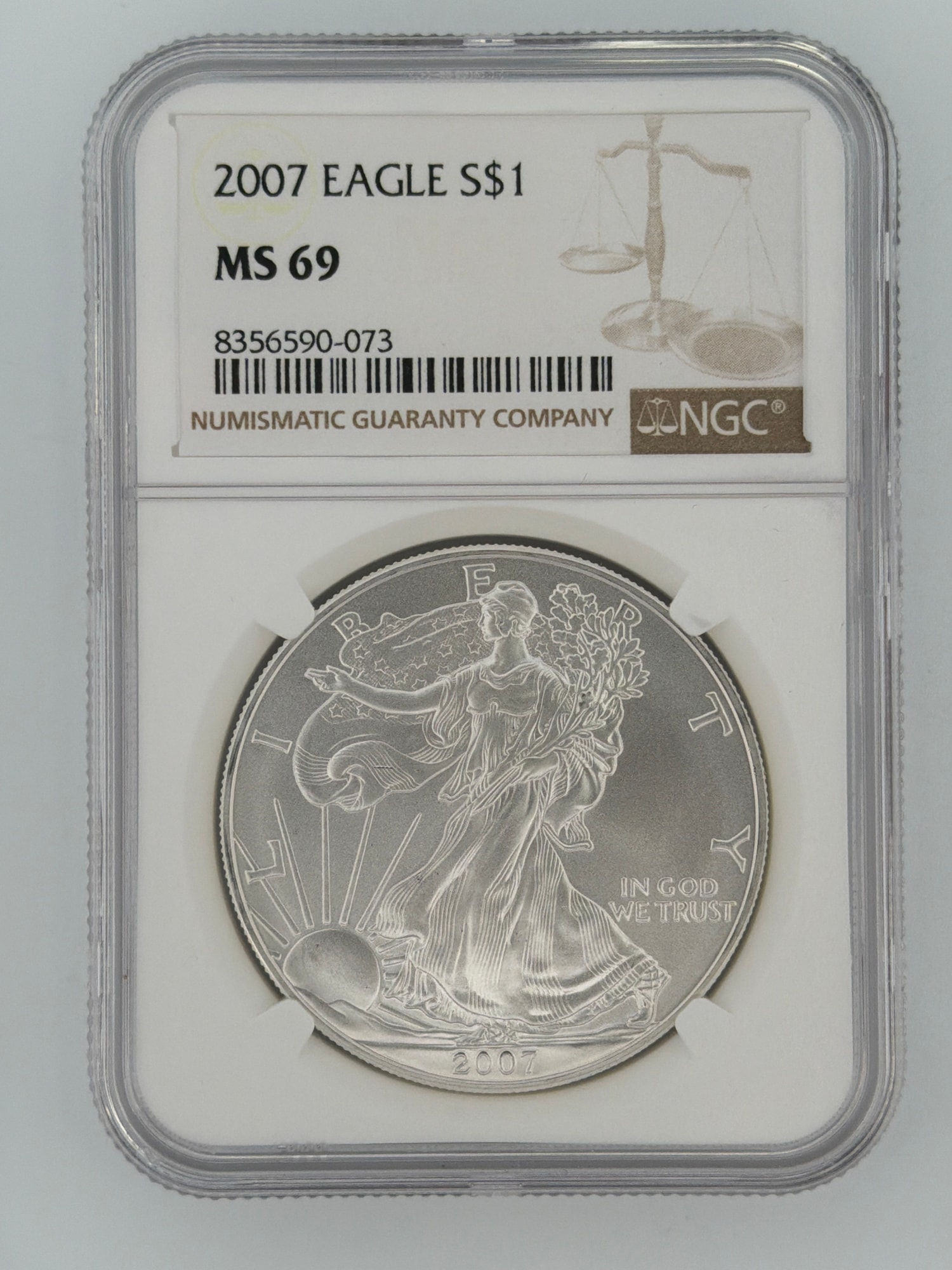 2007 American Silver Eagle NGC MS-69 obverse in slab showing Walking Liberty design and NGC label with certification number 8356590-073