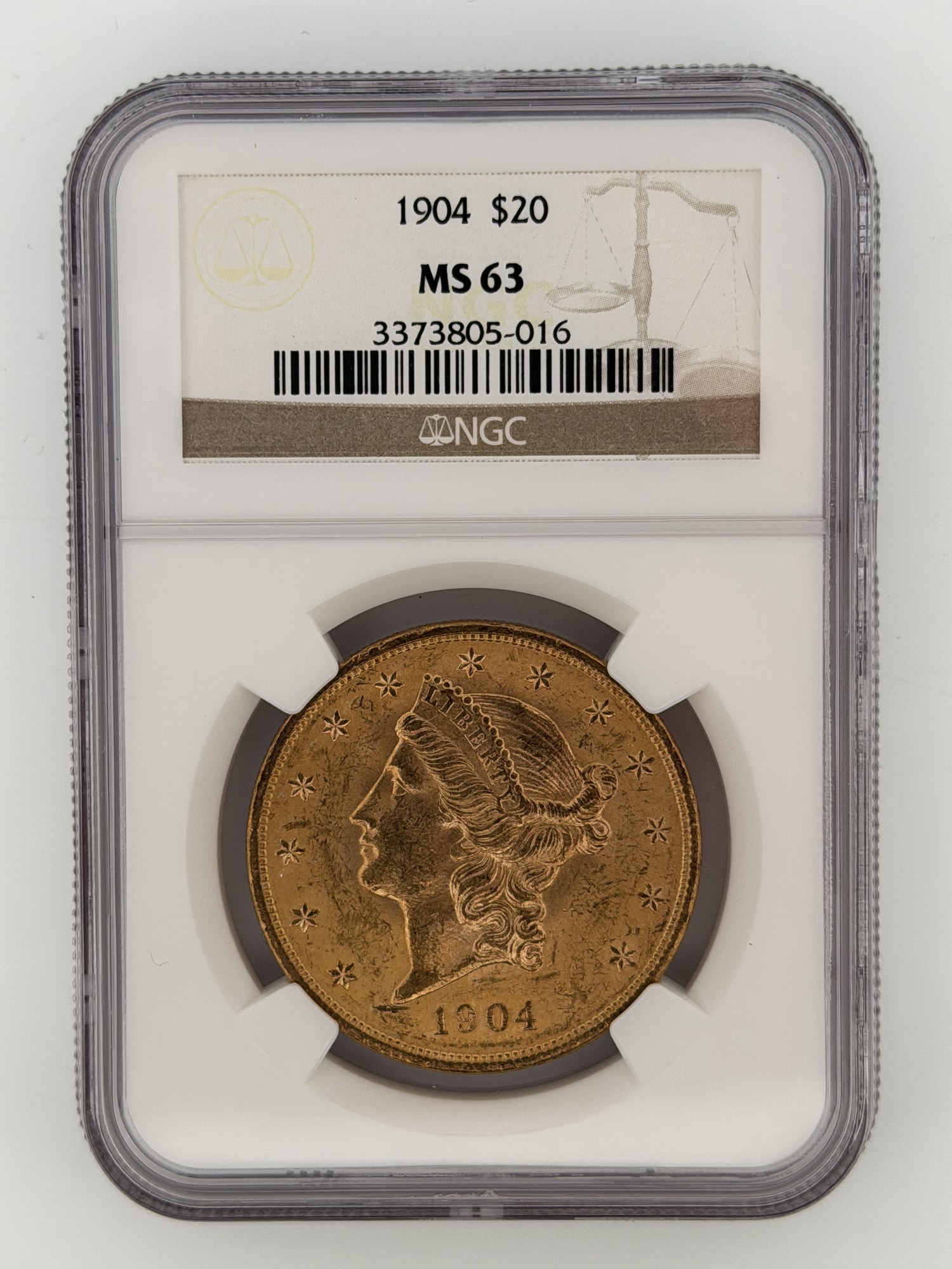 1904 Liberty Head Double Eagle $20 Gold NGC MS63 obverse showing Liberty portrait, 13 stars, and date in NGC slab
